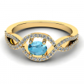 Pierścionek złoty z błękitnym topazem i brylantami