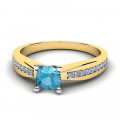 Pierścionek złoty zaręczynowy z błękitną cyrkonią