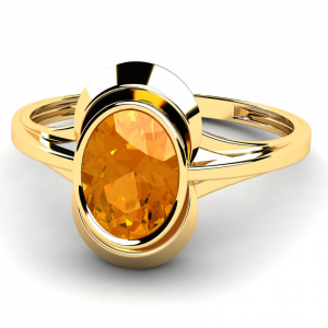 Pierścionek złoty z owalną pomarańczową cyrkonią