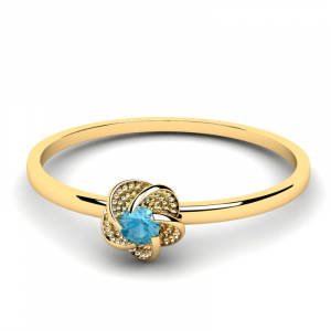 Pierścionek złoty kwiatuszek z błękitną cyrkonią