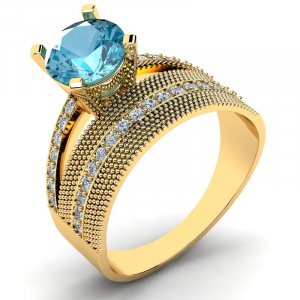 Pierścionek złoty zaręczynowy z niebieską cyrkonią