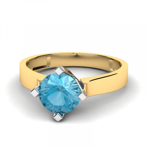 Klasyczny pierścionek złoty z niebieską cyrkonią 
